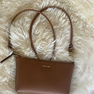 Small gold and tan crossbody bag